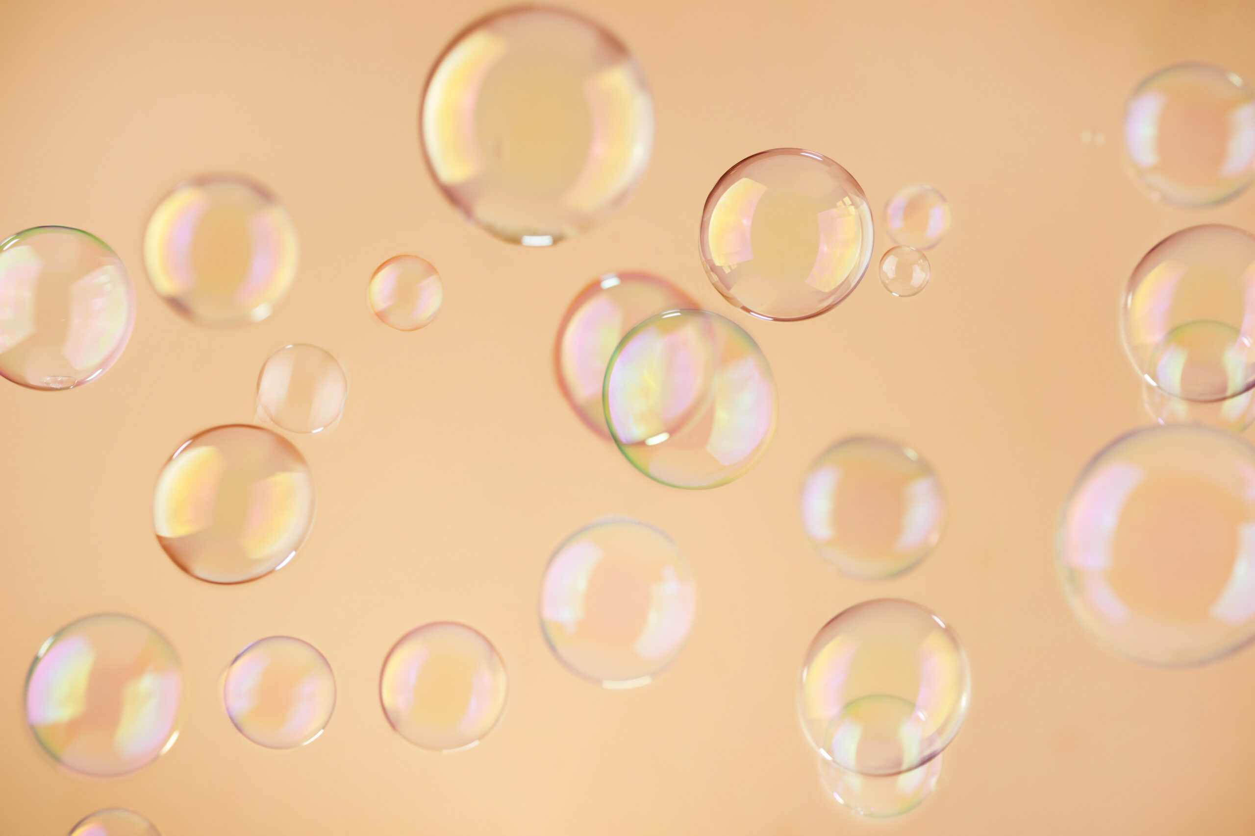 Abstract orange soap bubbles background. Orange soap bubbles wal