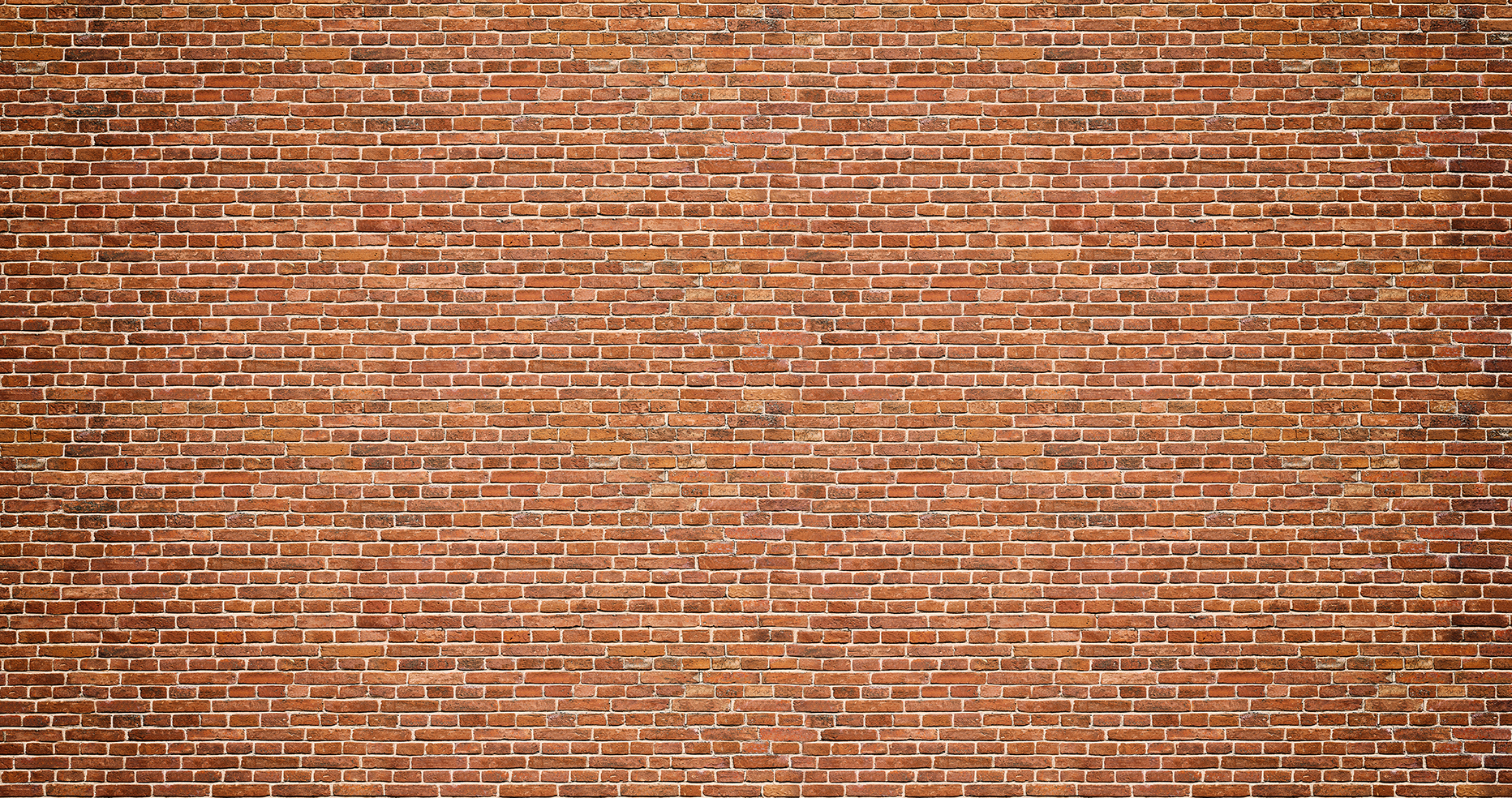 Old red brick wall background, wide panorama of masonry