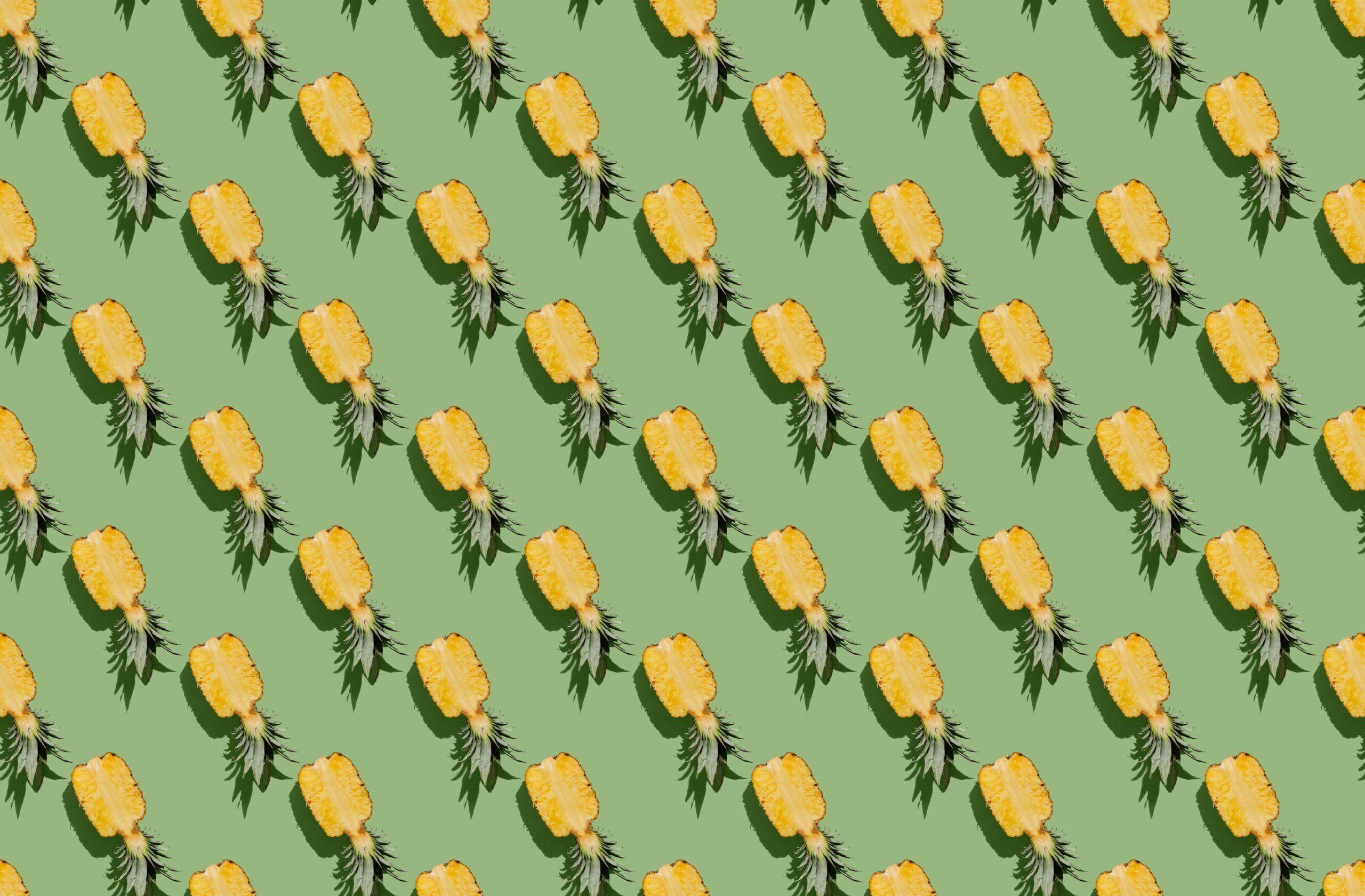 Pattern,Of,Pineapple,On,Green,Background