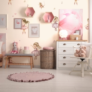 Stylish child's room interior with beautiful pictures and comfor